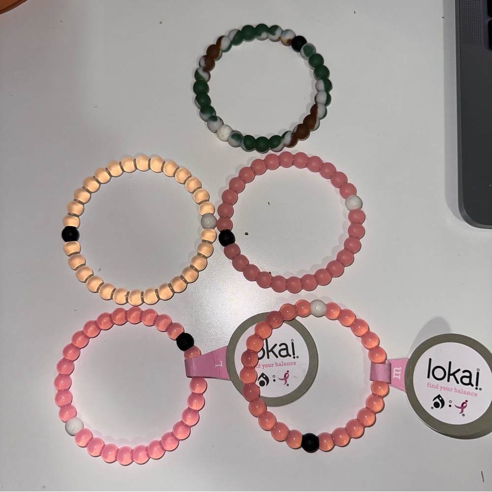 5 Loki’s brackets in pink, clear and army print size M and L